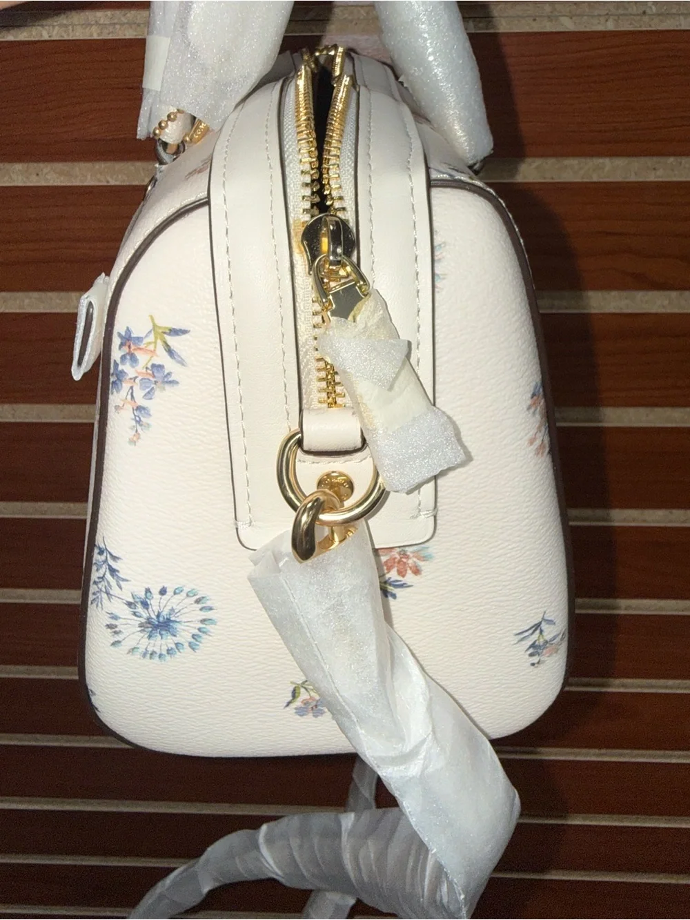 Coach Rowan Satchel in the white Dandelion Floral